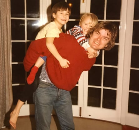 From left to right: James and David Challen with their father Richard at home in Ruxley Ridge, Claygate