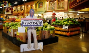 A sign in Spanish which translates to ‘Don’t lose your voice, vote!’ is displayed near a polling place in a supermarket in Las Vegas, Nevada, in June 2016.