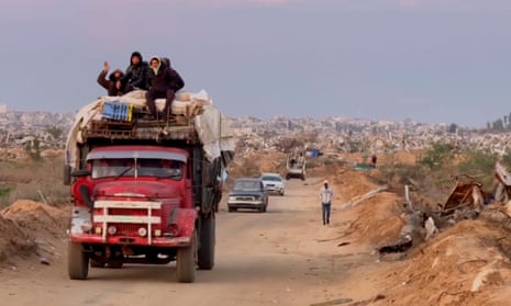 Displaced people move through the Netzarim Corridor after Israel's withdrawal.