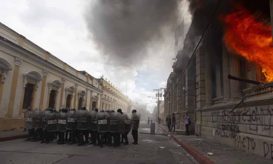 Flames shoot out from the Congress building in Guatemala City.