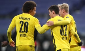 Giovanni Reyna (centre) celebrates a spectacular goal for Borussia Dortmund with teammates.