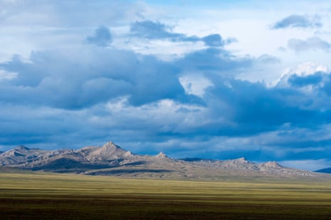 A landscape with mountains and clouds in Hustain national park, Mongolia.