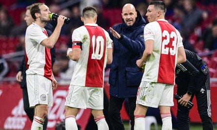 Ajax manager Erik ten Hag talks to his players during a KNVB Cup quarter-final in Amsterdam