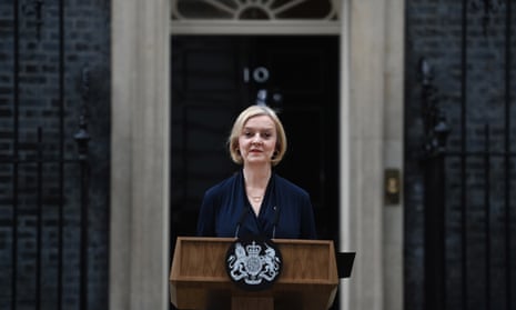 Liz Truss delivers a resignation statement outside 10 Downing Street.