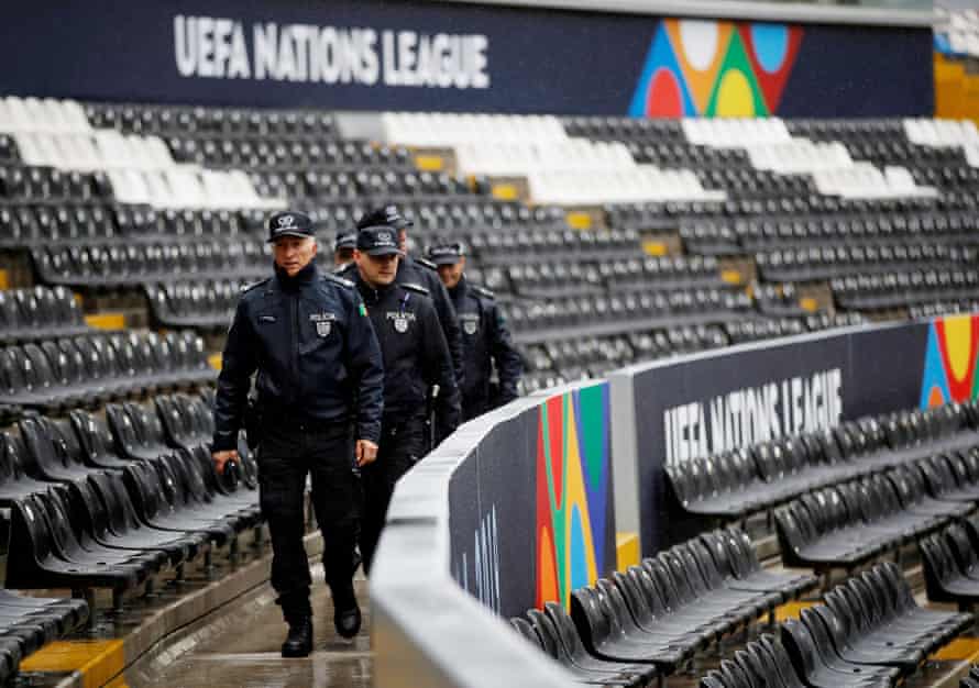 Police patrol the Estádio D Afonso Henriques stadium in Guimarães before England’s Nations League semi-final defeat against the Netherlands.