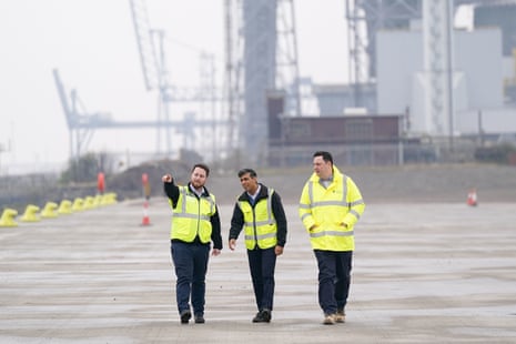 Rishi Sunak walking along the newly constructed South Bank quay in Redcar today with Tees Valley Mayor Ben Houchen (right) and Redcar MP Jacob Young (left).