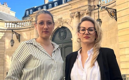 Élisabeth Guthmann, left, and Anne, co-founders of the collective SOS Périscolaire, outside the Élysée Palace in Paris.