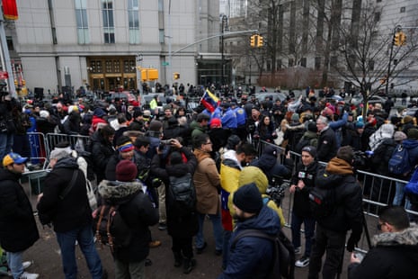 People protest against U.S. strikes against Venezuela and the capture of Venezuelan President Nicolas Maduro, outside the Daniel Patrick Moynihan United States Courthouse ahead of his arraignment to face U.S. federal charges including narco-terrorism, conspiracy, drug trafficking, money laundering and others in New York City, U.S., January 5, 2026.