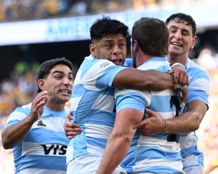 Argentina players celebrate a Julian Montoya try during their Rugby Championship Test against Australia at Allianz Stadium