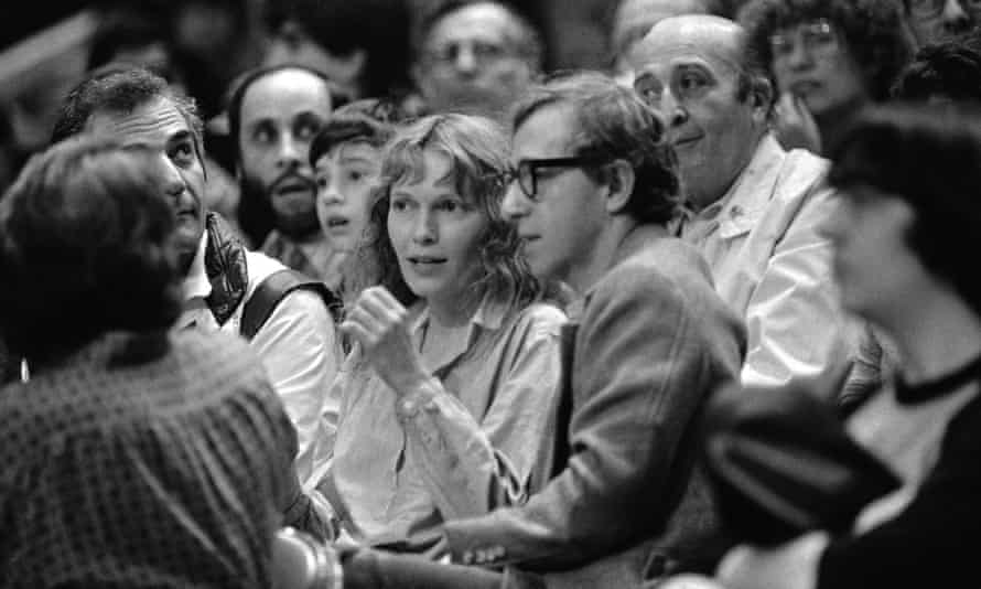 Woody Allen and Mia Farrow at a Philadelphia 76ers and New York Knicks game in New York in 1983.