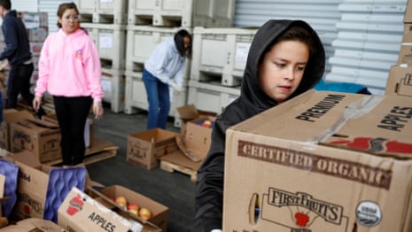 Cleveland residents line up at a food bank during the coronavirus pandemic - video