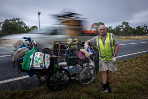 Leonard Monaghan with his custom-build rubbish collection trolley outside Warwick.