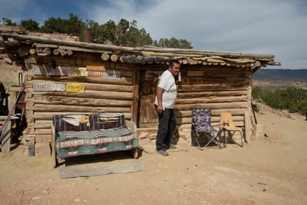 Edison Johnson steps outside his home on the Navajo Nation, south of Shiprock.