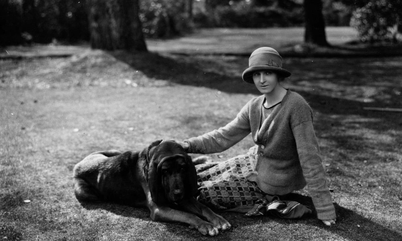 Rose MacaulayEnglish novelist, essayist and travel writer Rose Macaulay (1881 - 1958) sitting with bloodhound dog in the garden of Michael Sadleir (formerly Sadler). Original Publication: People Disc - HH0262 (Photo by Sasha/Getty Images)