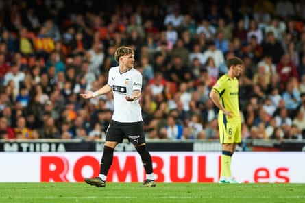 Valencia’s Harvey Elliott looks back as he walks off the pitch after his red card