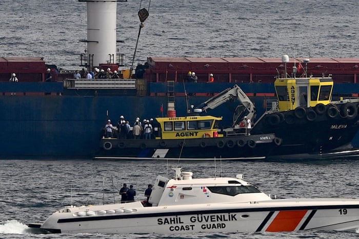 An inspection delegation boarding the Sierra Leone-flagged cargo ship Razoni carrying 26,000 tonnes of corn from Ukraine, off the coast of north-west Istanbul today.