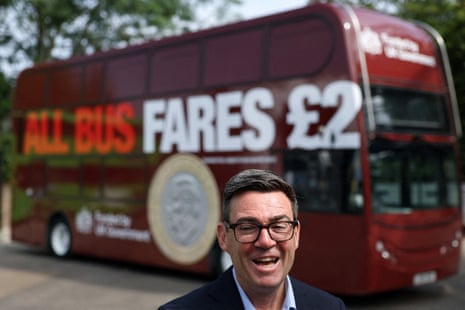 Andy Burnham stood in front of a bus during an interview in Bath.