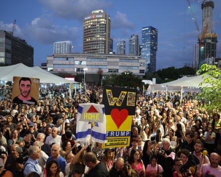 People celebrate after a peace deal is announced at Hostages Square in Tel Aviv, Israel, on Thursday.