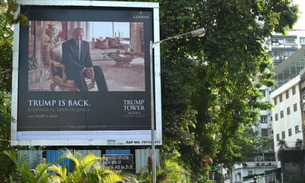 A billboard for Trump Tower Mumbai is seen next to a busy road in Mumbai in June.