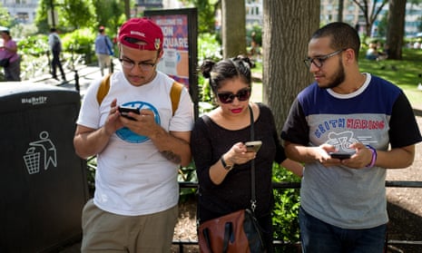 A group of friends play Pokémon Go in New York.