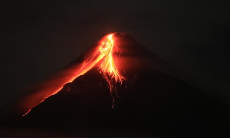 Mount Mayon expels lava during an eruption in Albay province, south of Manila, Philippines