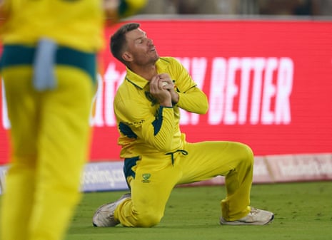 Australia's David Warner takes the catch to dismiss England's Moeen Ali, off the bowling of Adam Zampa.