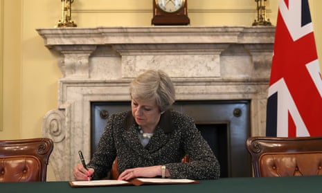Theresa May signs the official letter to the European council president, Donald Tusk, invoking article 50.
