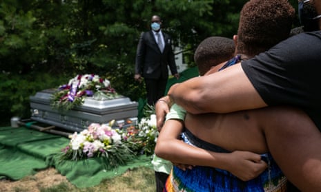 Family and friends mourn the death of Conrad Coleman Jr at his burial service on 3 July, 2020 in Rye, New York. Coleman, 39, died of Covid-19 in June, just over two months after his father also died of the disease.