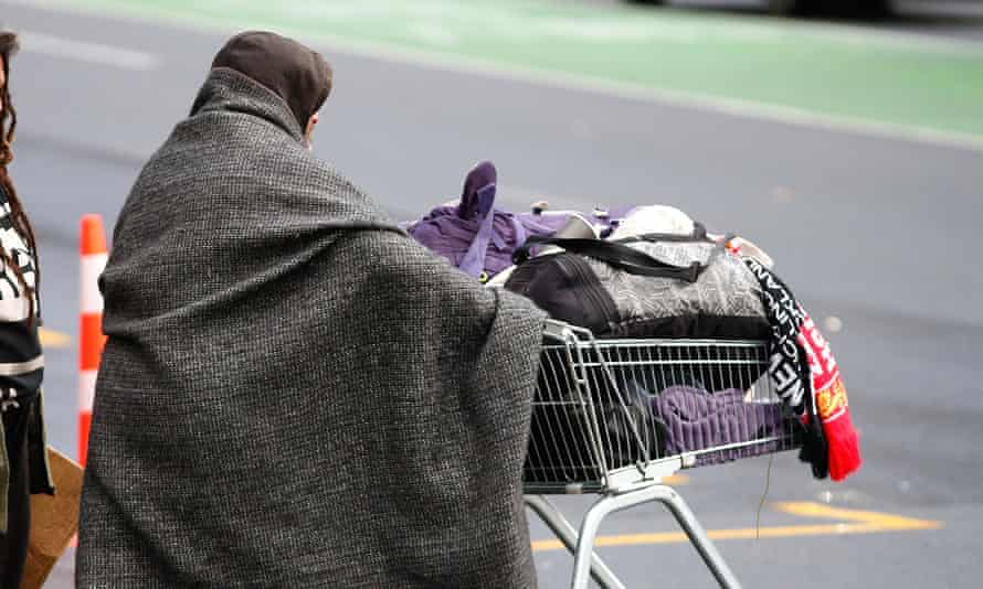 New Zealand’s homeless have been moved off the streets, but the crisis endures A homeless person pushes a trolley.