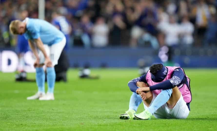 Manchester City players slump to the turf following their 1-0 defeat to Chelsea in last year’s Champions League final