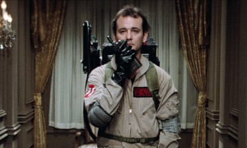 Bill Murray wearing ghostbusting equipment on his back in Ghostbusters