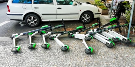 Line of e-scooters on the ground