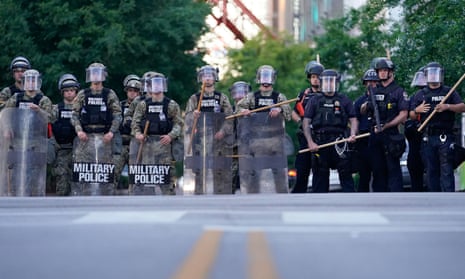 Law enforcement block a street during a protest in Louisville, Kentucky. Officers involved in the shooting failed to active body cameras.