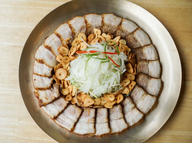 A plate of bo ssam, Korean-style boiled pork belly.