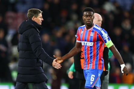 Marc Guéhi shakes hands with Oliver Glasner