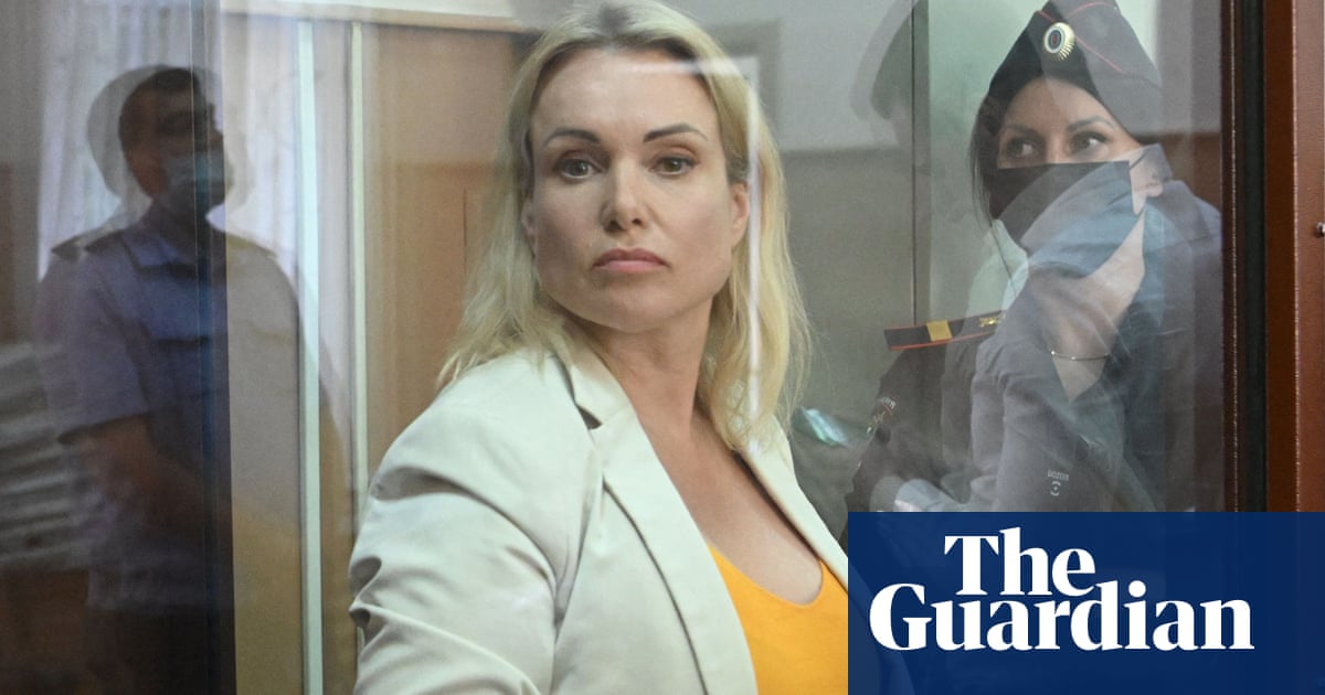 Russian woman behind on-air war protest reportedly escapes house arrest – The Guardian