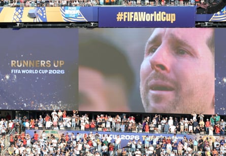 A tearful Lionel Messi on the pitch after the match.