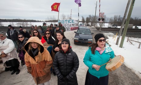 First Nations women form a blockade in Ontario on 19 March 2014 to call attention to missing and murdered indigenous and aboriginal women. 