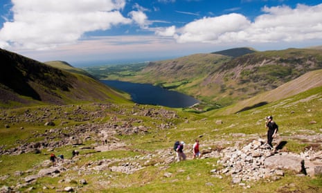 Campaigners say using tarmac would compromise the historic and rural character of Lake District’s path.