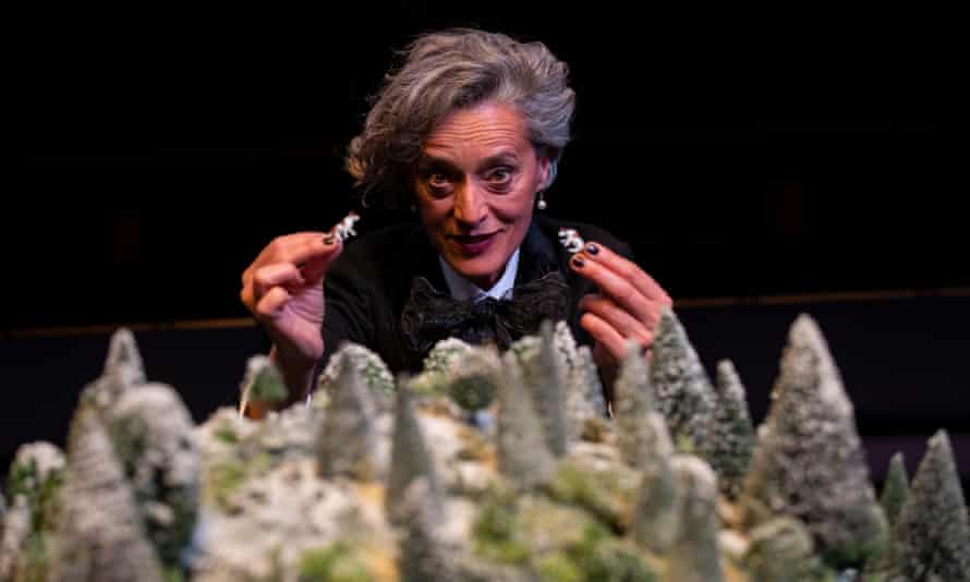 Eva Magyar as the tour guide with a model of a forest.