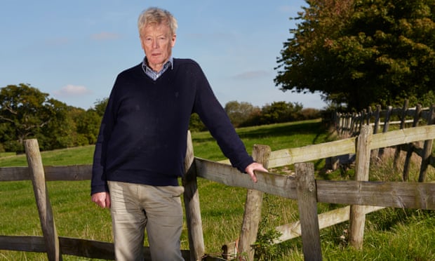 Roger Scruton, leaning against a fence at his Wiltshire home in 2015.
