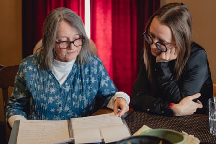 Rita Buckley, left, and her daughter Sarah Buckley review notes.