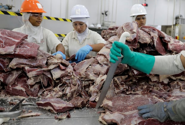 Employees prepare jerked beef at a plant of JBS SA the world’s largest beef producer, in Santana de Parnaiba, Brazil.