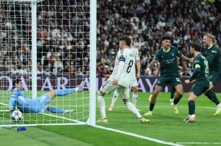 Nico O'Reilly (third right) scores Manchester City’s equaliser