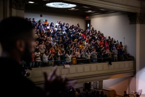 Students rally over dozens of racist incidents at Syracuse University in New York, on 20 November.