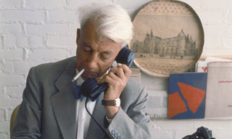 Sandberg at his desk at the Stedelijk Museum, c1960