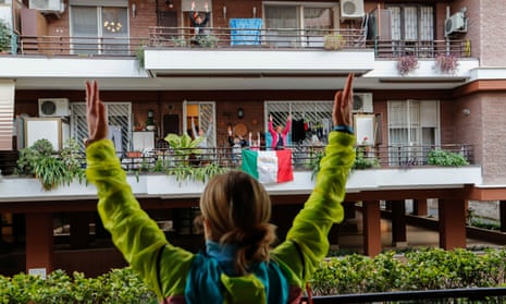 Personal trainer Antonietta Orsini, in March 2020, giving a class from the balcony for her neighbours in Rome.