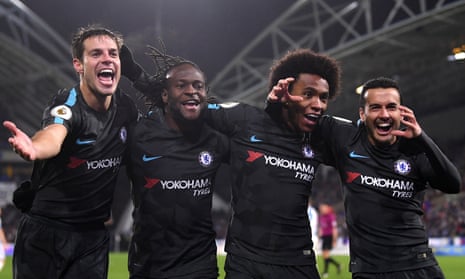 Cesar Azpilicueta, Victor Moses, Willian, and Pedro celebrate the third goal for Chelsea.