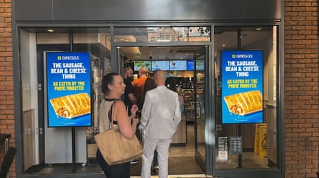 Signs outside Greggs in Manchester