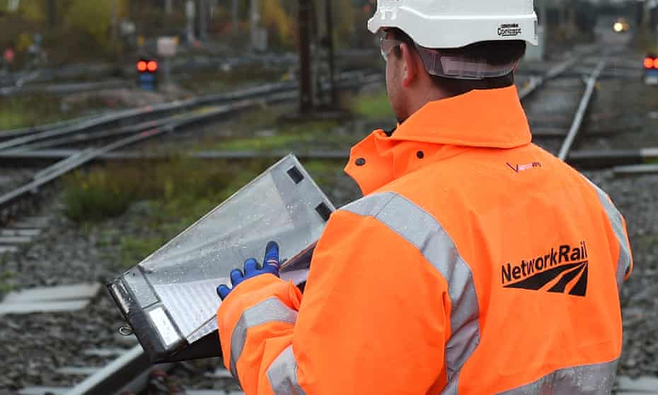 Network Rail engineer inspecting tracks